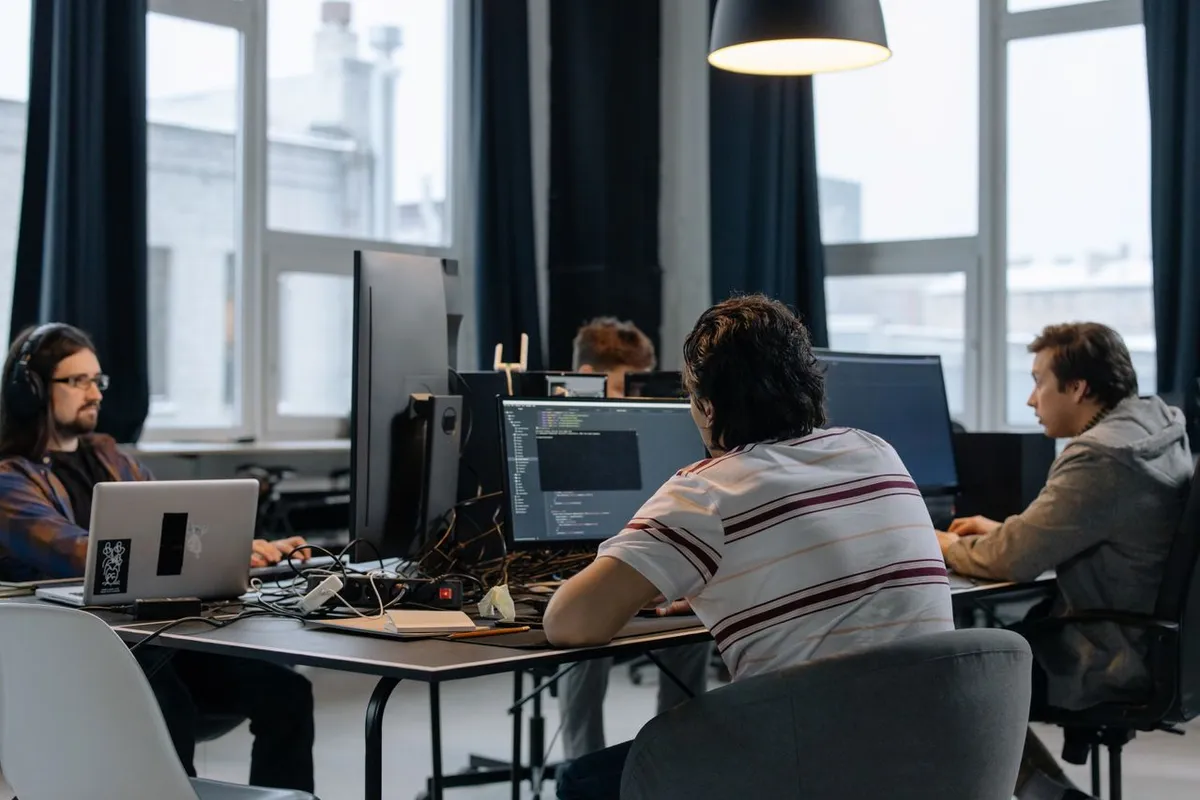 AnyPlace software engineering team analyzing system architecture, delivery milestones, and client case metrics