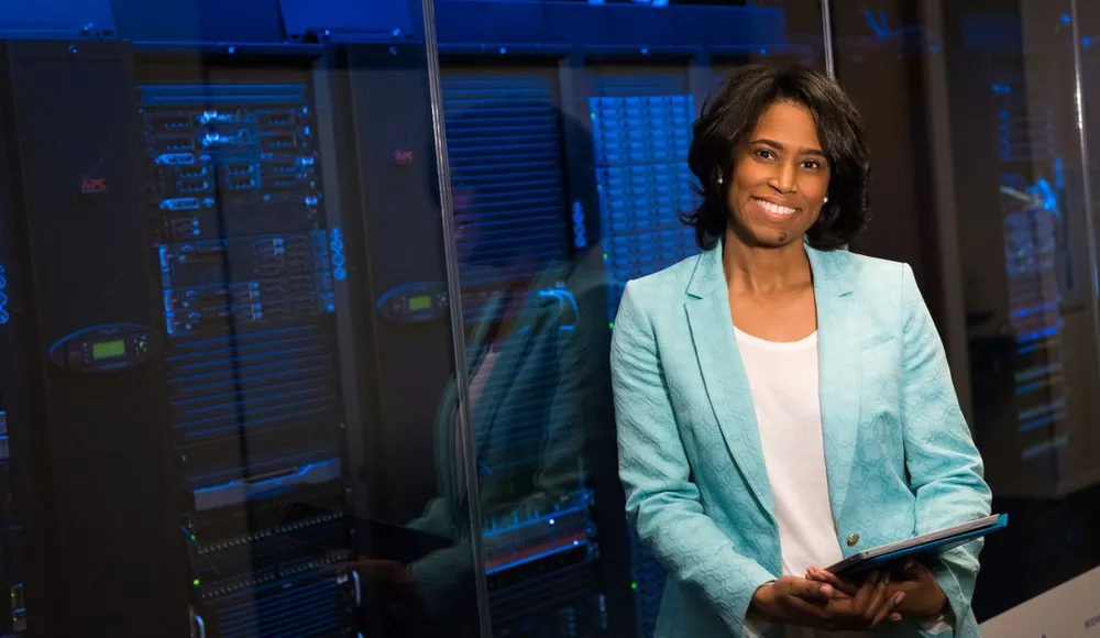 Scientist data server room infrastructure powering enterprise AI pilot measurement